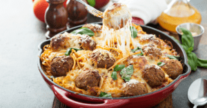 Meatballs Casserole with Cheese, Spaghetti and Tomato Sauce