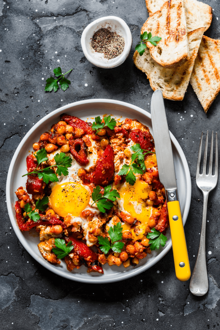 30 Easy Middle Eastern Recipes Insanely Good   Shakshuka With Chickpeas Eggs And Sweet Peppers 750x1125 