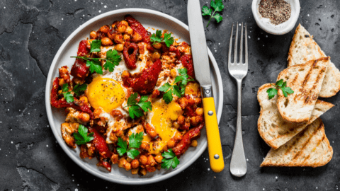 Shakshuka with Eggs, Chickpeas and Bread