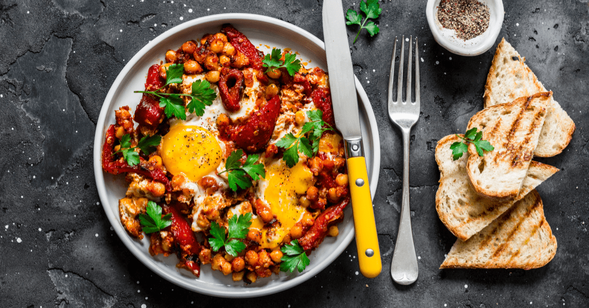 Shakshuka with Eggs, Chickpeas and Bread