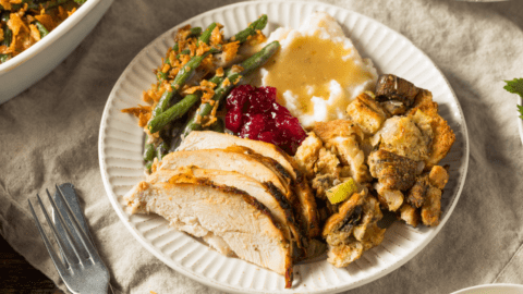 Thanksgiving Dinner with Turkey, Green Beans, Mashed Potatoes, Cranberry and Stuffing