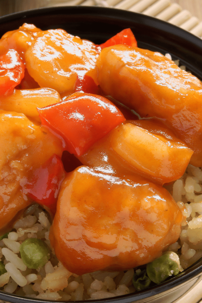 Bowl of Sweet and Sour Chicken Balls and Fried Rice