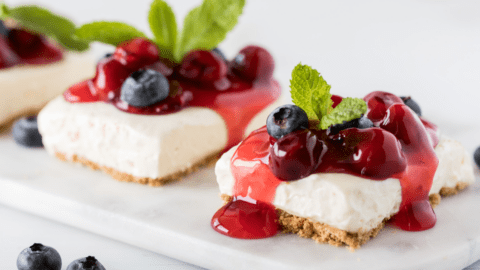Cherry Cheesecake with Berry Sauce