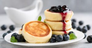 Cottage Cheese Pancakes or Snyrniki with Blueberries and Jam