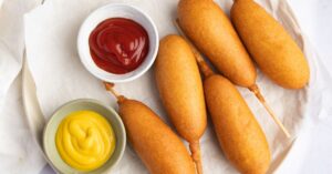 Delicious Homemade Air Fryer Corn Dogs with Mustard and Ketchup
