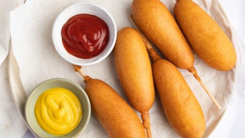 Delicious Homemade Air Fryer Corn Dogs with Mustard and Ketchup