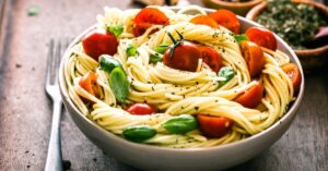 Bowl of Italian Pasta with Basil and Tomatoes
