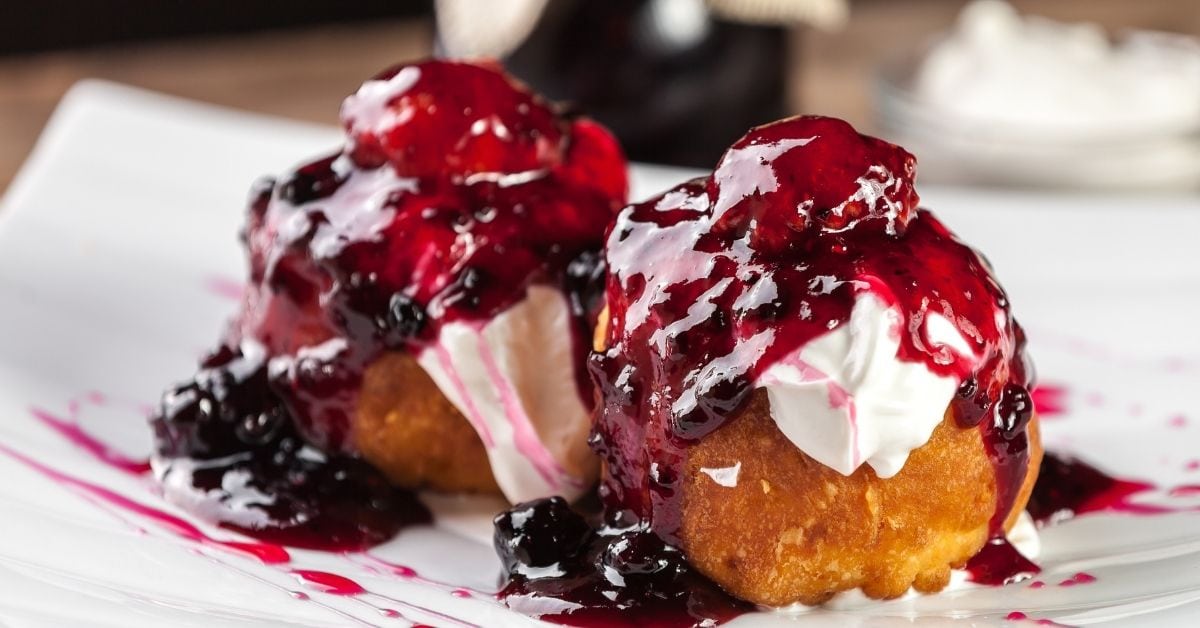 Romanian Cheese Donuts with Berry Sauce