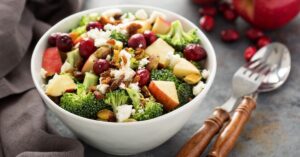 Bowl of Apple and Cranberry Salad with Bread Crumbs and Cheese