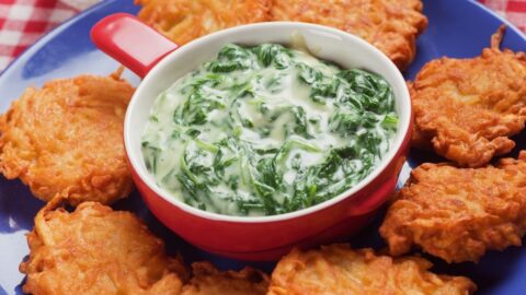 Bowl of Spinach Soup with Potato Pancakes