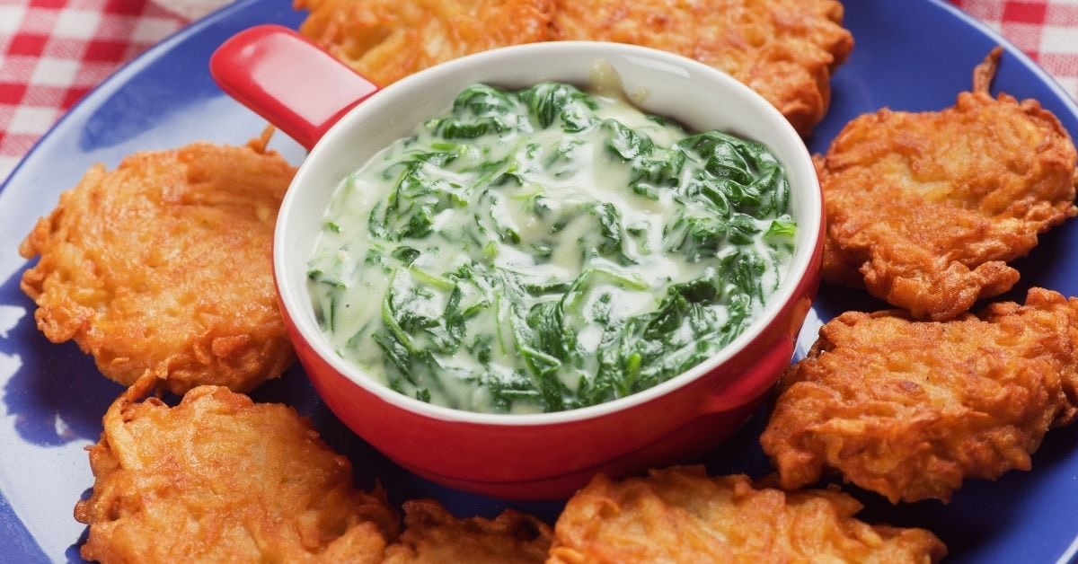 Bowl of Spinach Soup with Potato Pancakes