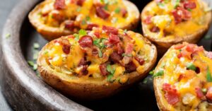Cheesy Baked Potato Skins with Bacon and Onions