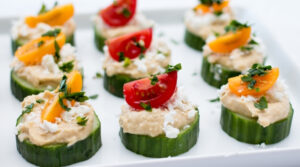 Cucumber Bites with Hummus and Tomatoes