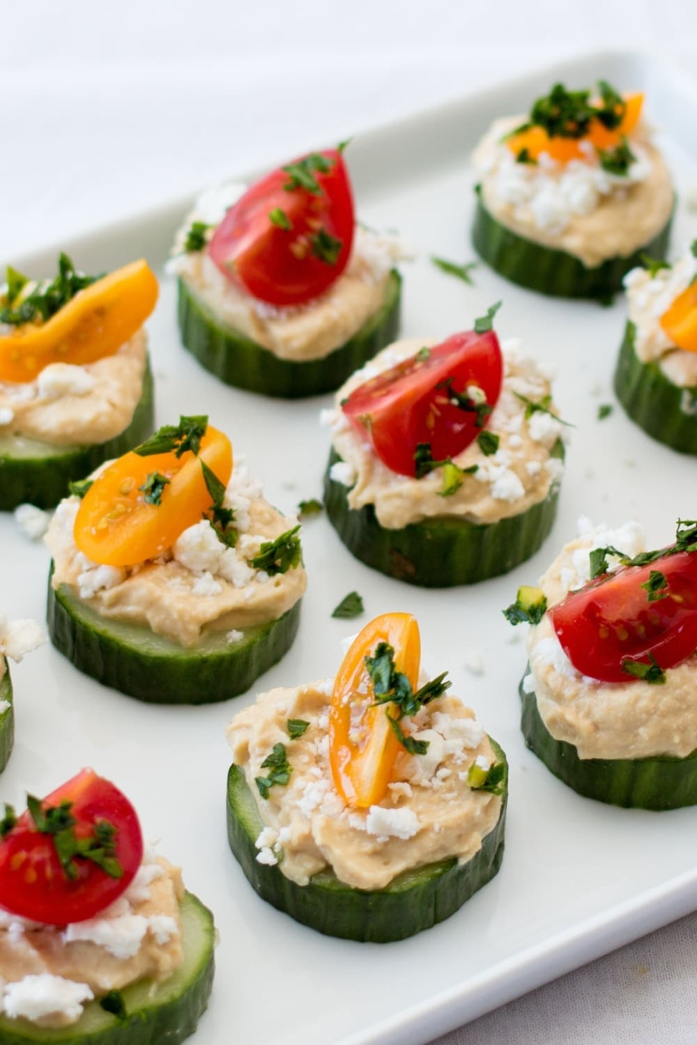 20 Easy Cucumber Appetizers: Cucumber and Tomato Bites with Hummus
