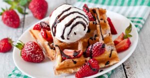 Homemade Belgian Waffles with Ice Cream and Strawberries