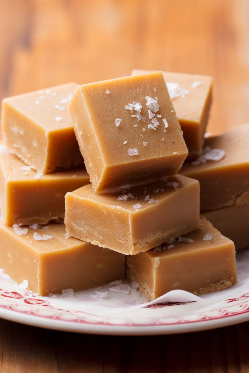 Bunch of stack caramel fudge on a plate. 