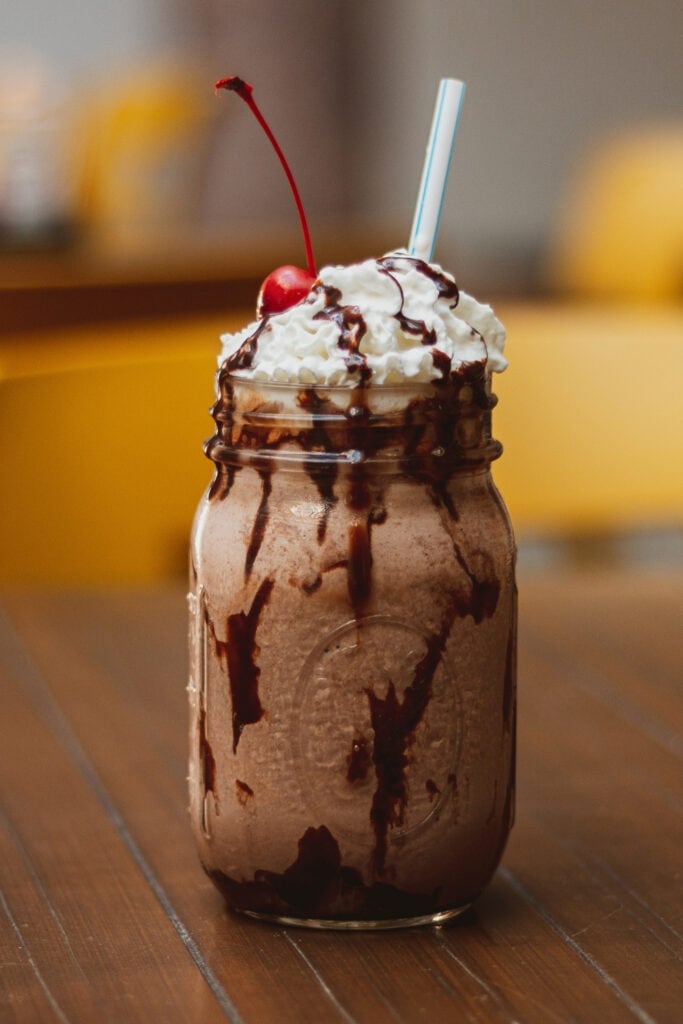 Homemade Chocolate Shake with Cherry and Whipped Cream