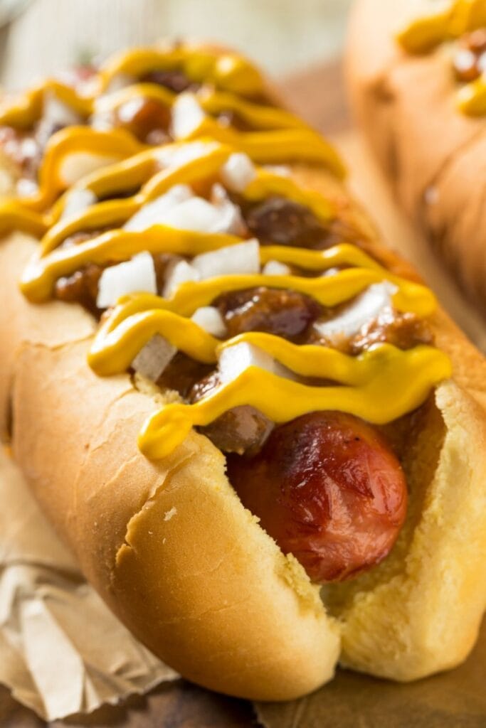 Homemade Hot Dogs in a Bun with Mustard Sauce