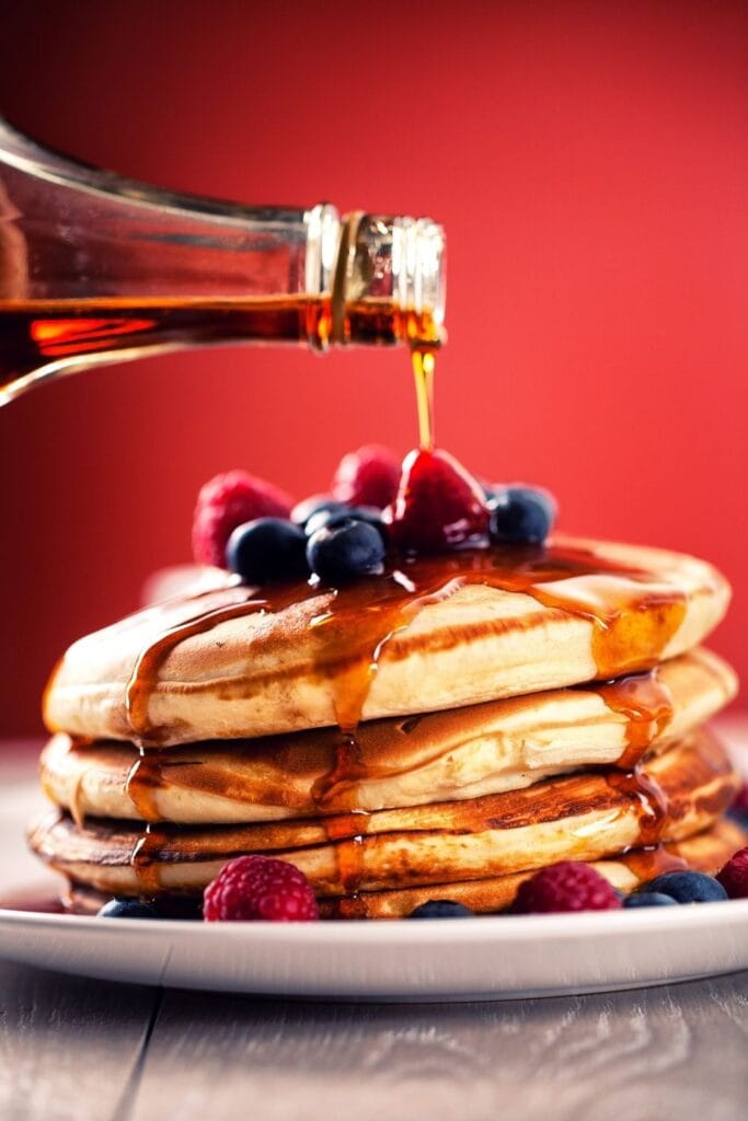 Homemade Pancakes with Berries and Maple Syrup