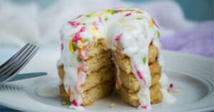 Homemade Vegan Pancakes with Candy Sprinkles and Frosting