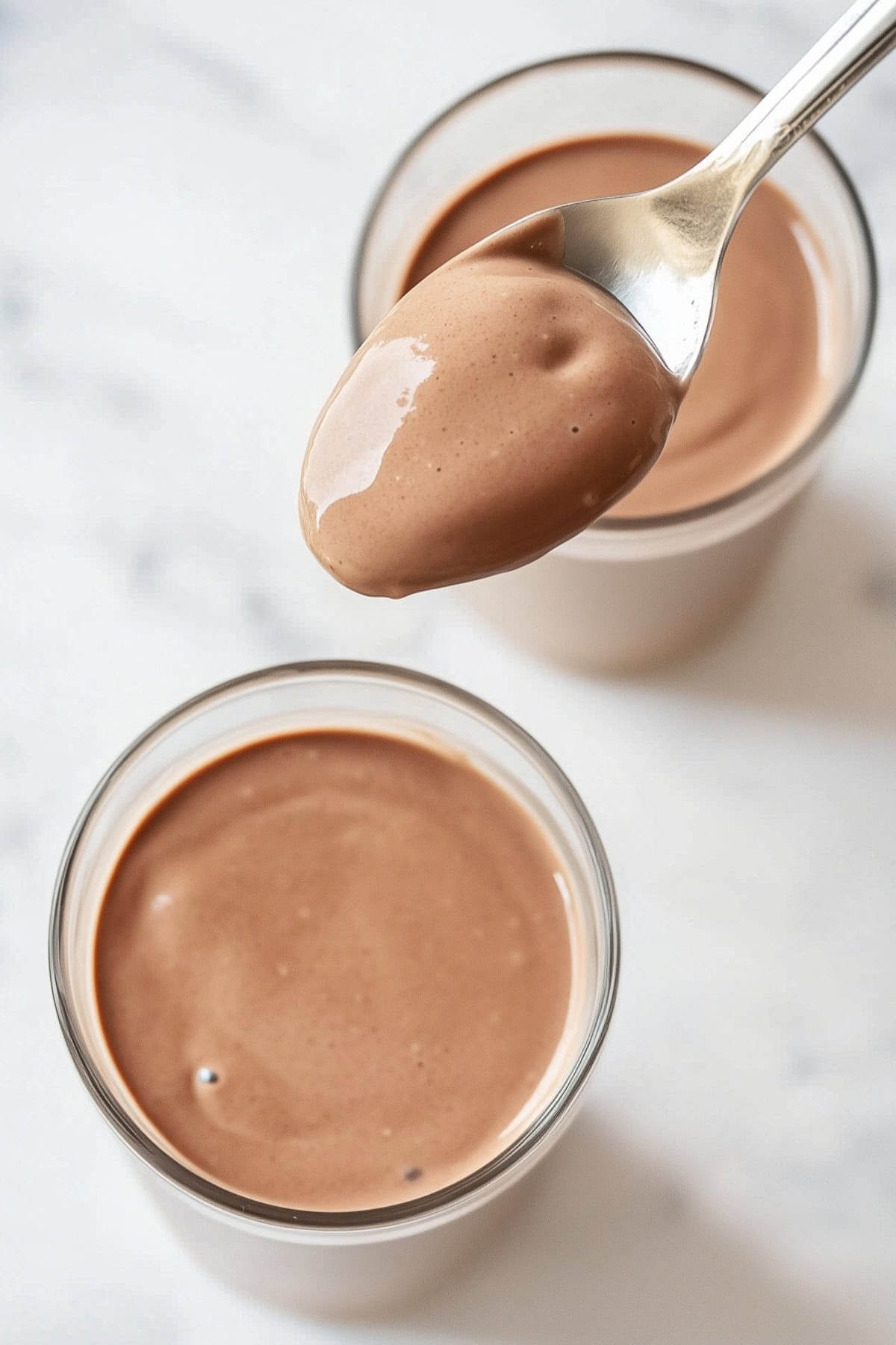 A spoonful of McDonalds Chocolate Milkshake