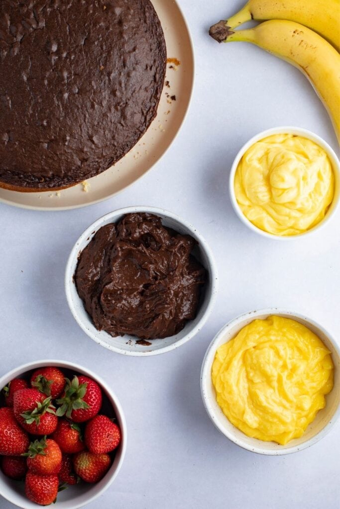 Atomic Cake Ingredients: Fresh Strawberries, Fresh Bananas, Chocolate, Vanilla and Banana Jell-O Pudding