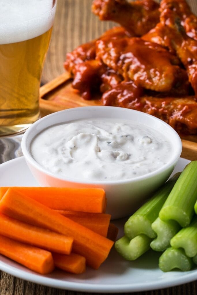 Blue Cheese Dressing with Buffalo Chicken Wings and Vegetables
