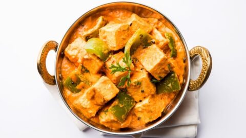Bowl of Achari or Malai Paneer