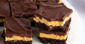 Homemade Buckeye Brownies Layered with Peanut Butter and Decadent Chocolate