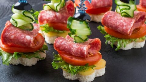 Appetizing Canape with Sausage and Vegetables on Skewers