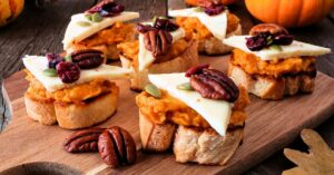 Appetizing Crostini with Pumpkin Spread, Walnuts and Cheese
