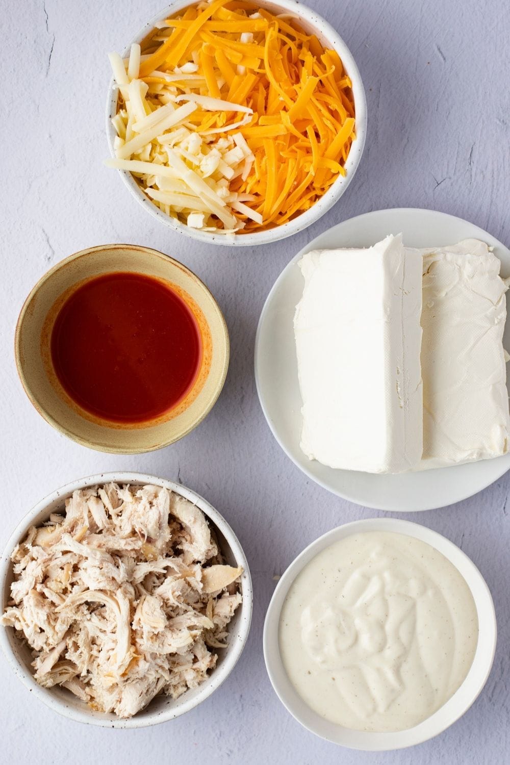 Buffalo Chicken Dip Ingredients: Red Hot Sauce, Chicken, Celery, Blue Cheese and Cream Cheese
