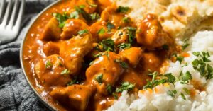 Butter Chicken with Rice, Naan Bread and Herbs