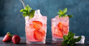 Cold Strawberry Cocktail with Fresh Strawberries and Mint