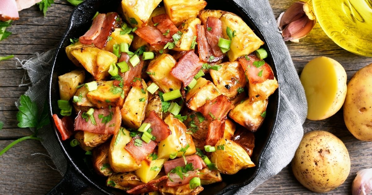 Homemade Fried Potatoes and Bacon in a Skillet