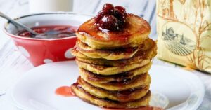 Homemade Johnny Cakes with Milk and Strawberry Jam