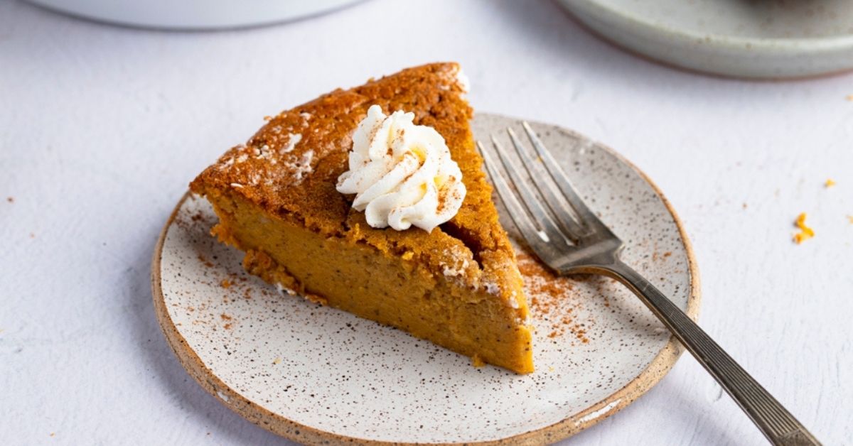 Slice of Homemade Pumpkin Pie with Whipped Cream