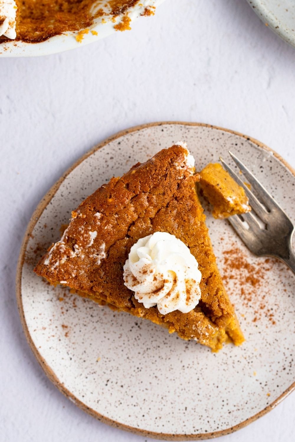 Slice of Impossible Pumpkin Pie in a Plate