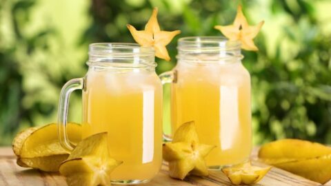 Starfruit Juice in a Mug Glass with Fresh Starfruits