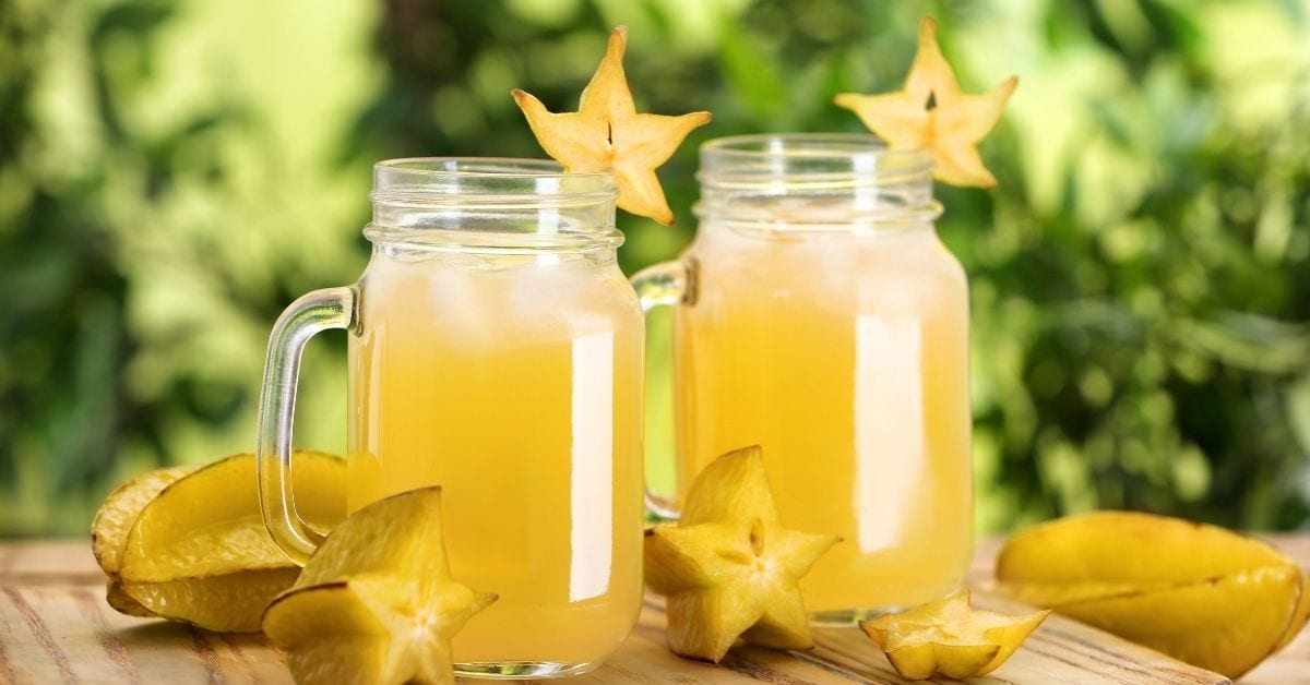 Starfruit Juice in a Mug Glass with Fresh Starfruits