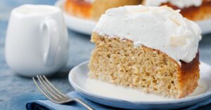 A Slice of Sweet Tres Leches Cake with Milk