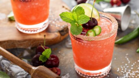 Cold Cherry Cocktail with Mint in Glasses