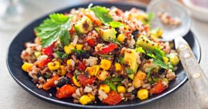 Corn, Quinoa, Avocado, Tomato and Rice Salad with Chili Dressing