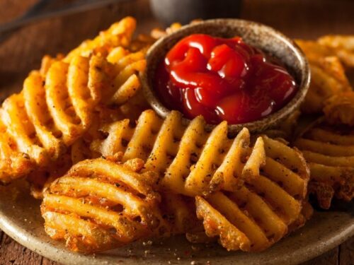 https://insanelygoodrecipes.com/wp-content/uploads/2021/10/Homemade-Chick-Fil-A-Waffle-Fries-with-Ketchup-500x375.jpg