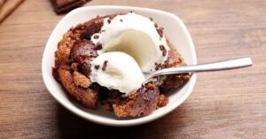 Homemade Chocolate Pudding Cake with Ice Cream in a Bowl