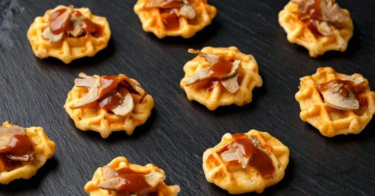 https://insanelygoodrecipes.com/wp-content/uploads/2021/10/Homemade-Mini-Waffle-with-Roasted-Duck-and-Sauce.jpg