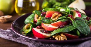 Homemade Spinach Salad with walnuts, Apples and Dried Cranberries