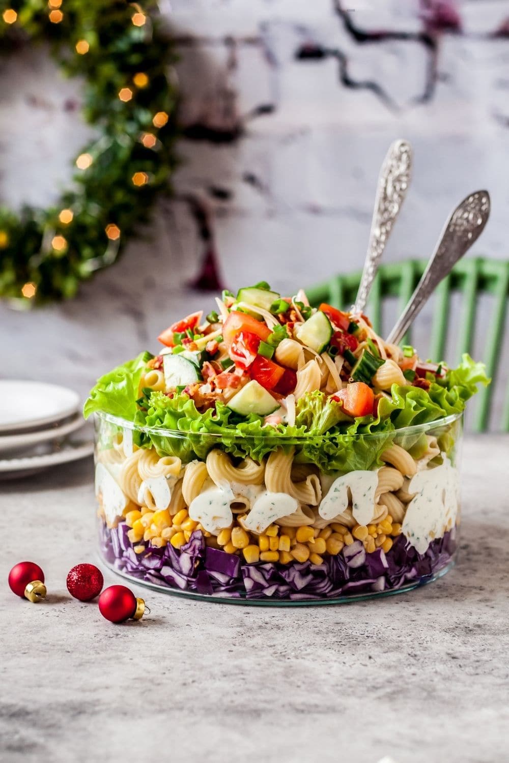 Layered Pasta Salad with Red Cabbage, Corn, Tomatoes, Cucumber and Herbs