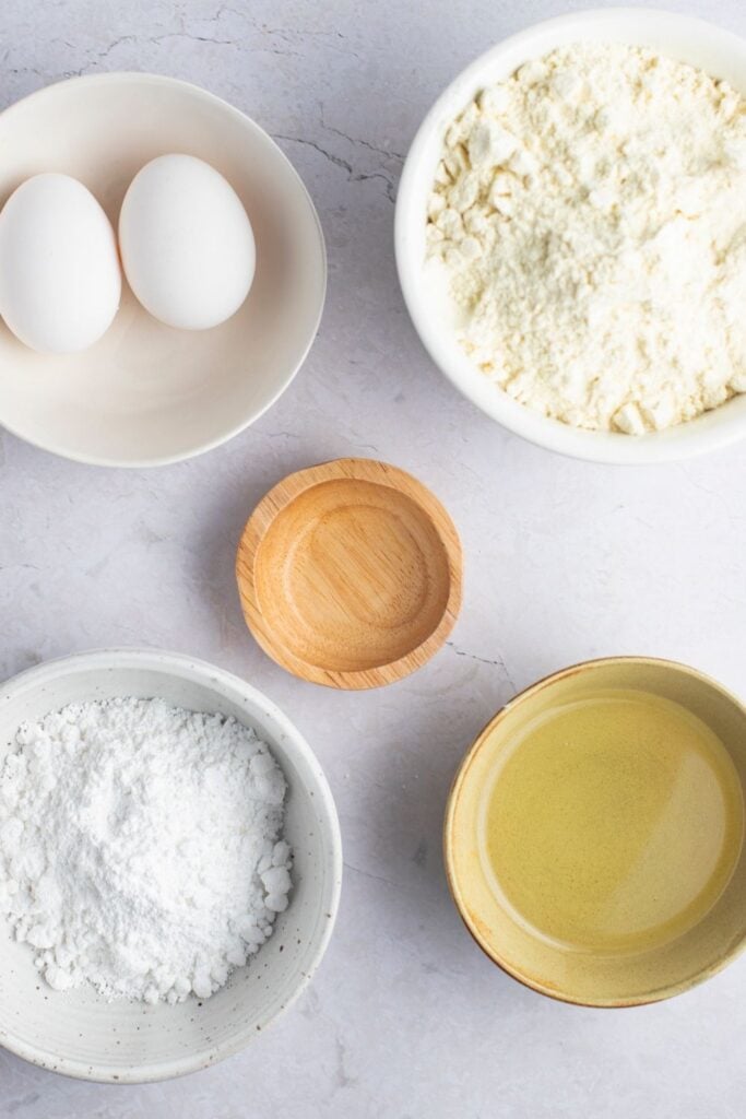 Lemon Cake Mix Cookies Ingredients: Lemon Cake Mix, Eggs, Vegetable Oil, Lemon Extract and Powdered Sugar