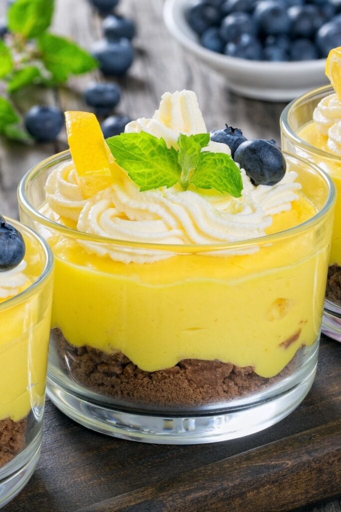 Lemon Curd Mousse with Whipped Cream and Blueberries